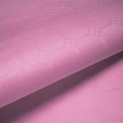 1 Rouleau nappe damassée rose en papier 6m x 1.18m REF/9282