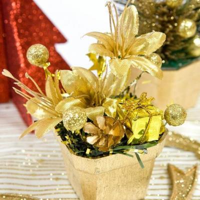 Composition florale de noel argent rouge dore or